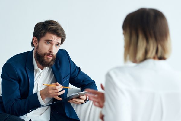 An IT recruiter interviewing a software developer candidate