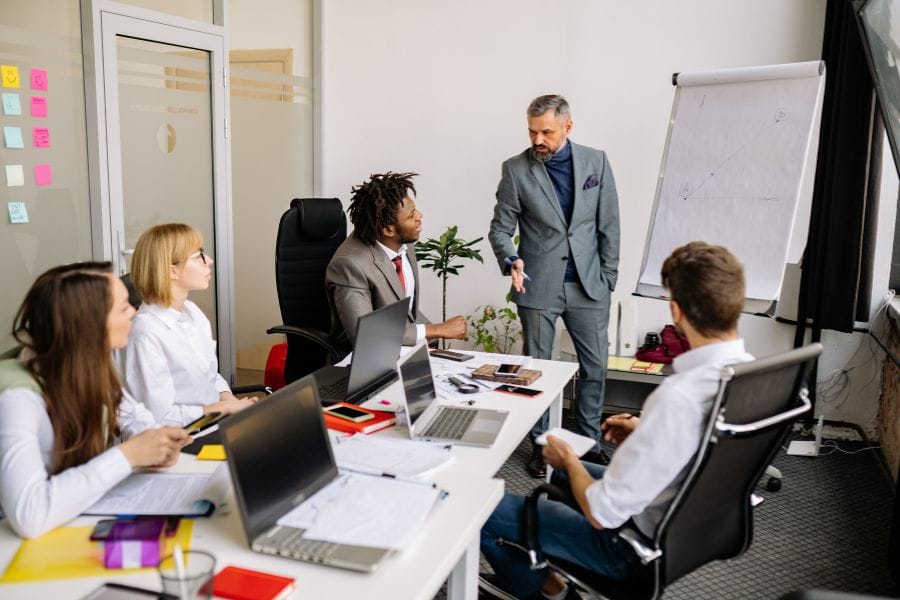 Employee Sales Coaching session in a training room companies